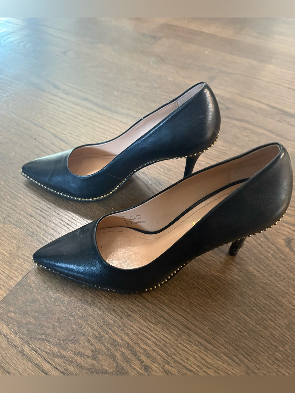 Coach Sz 7- perfect/ worn once-Black Pointed Leather Heels with Gold Stud Accent